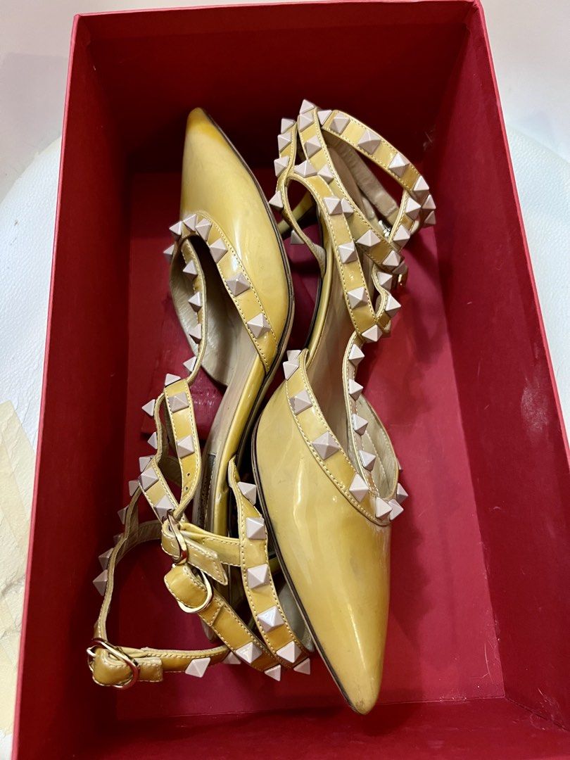VALENTINO Rockstud Ankle Strap Pump (Category: Sneakers & Footwear) located in Quezon City. Submitted by yassismom (Listing ID 1467010412, Image 2). Description: 8/10 condition, used around 5x sz US 8/EU 39, made in Italy 2 inch-heels caramel/beige color, patent leather includes box, cards and extra rubber sole rubber sole needs replacement (mura lang yan sa Mr. Quickie) bought for 60K+ before manage your expectation, this is a used item .