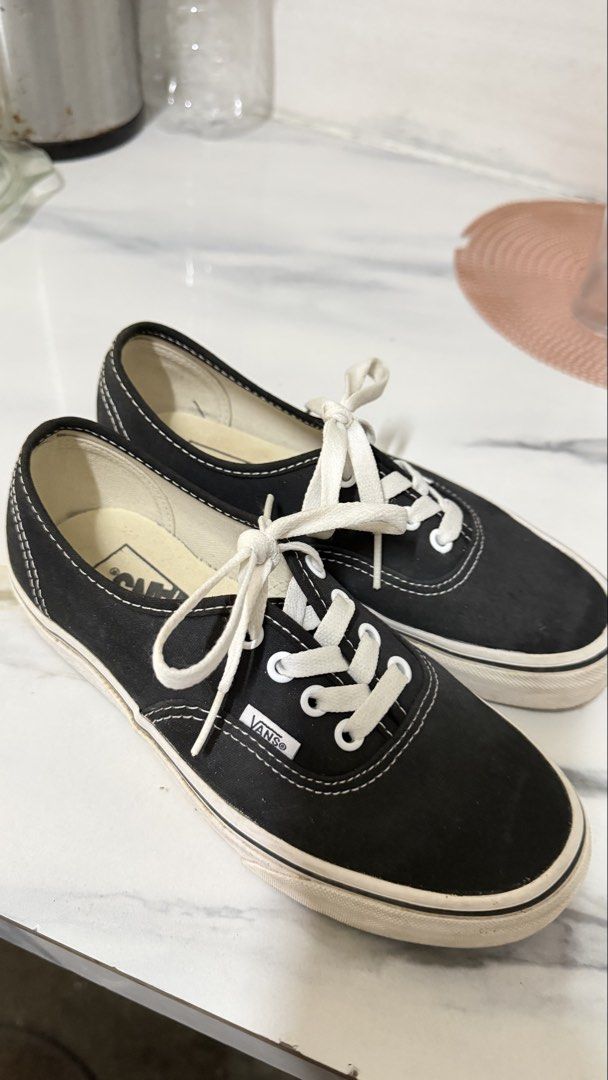 Vans Authentic Black Canvas Sneakers (Category: Sneakers) located in Valenzuela. Submitted by ruichi080607 (Listing ID 1467166381, Image 2). Description: - Model: Vans Authentic Low Top - Color: Black canvas with white contrast stitching and laces - Features: Signature waffle rubber outsoles and red 'Off The Wall' heel patches - Condition: Uppers in solid shape, with minor scuffs on the white midsoles from normal wear - Perfect for daily casual w