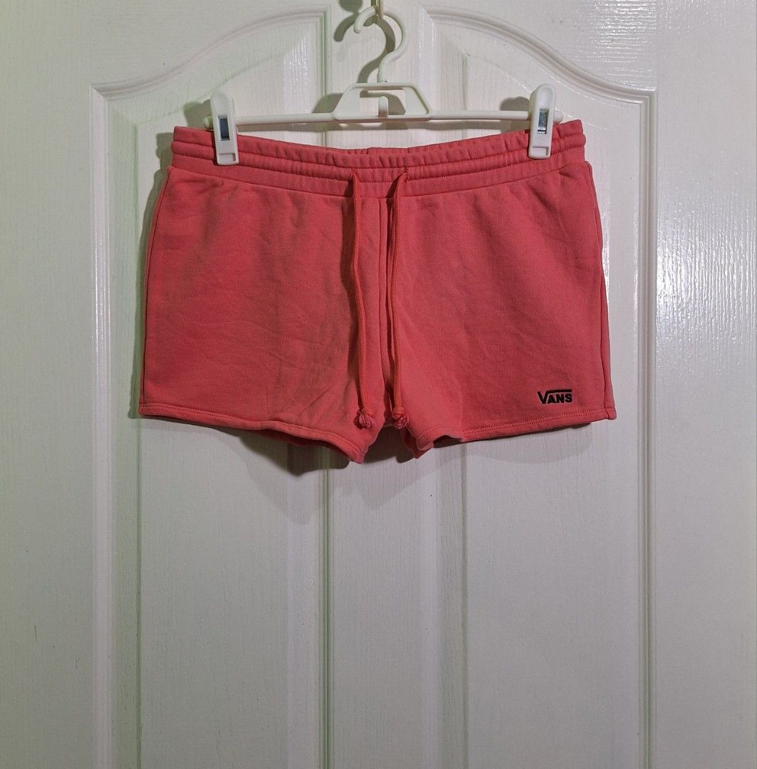 Vans hideaway pull on shorts medium nike adidas (Category: Shorts) located in San Pablo. Submitted by allyourbrandedneeds (Listing ID 1467040394, Image 3). Description: - Brand: Vans - Color: Coral Pink - Size: Medium (M) - Material: Soft and comfortable fleece - Features: Elastic waistband with adjustable drawstring, embroidered black Vans logo on left hem - Origin: Made in Vietnam - Condition: Great everyday piece for casual wear or lounging.