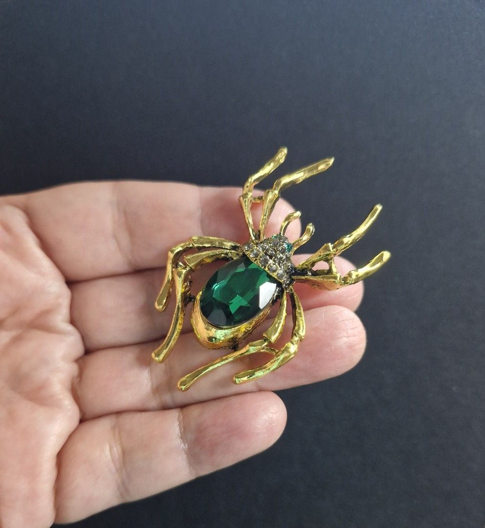 Velvet Spider Brooch Series 4 (Category: Brooches) located in Taguig. Submitted by mommaschoice (Listing ID 1466984245, Image 2). Description: Brand New Unisex Use Gold-Tone finish Adorned w/ Green rhinestone Lightweight won't damage the fabric Ships nationwide.