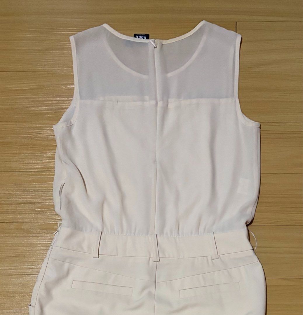 Vero Moda Cream Sleeveless Jumpsuit Small - Medium (Category: Rompers) located in Quezon City. Submitted by garagesale2026 (Listing ID 1467013272, Image 3). Description: - Used once - In very good condition - Original from Spain - Sheer neckline with front pleats; Side pockets; Back zipper closure - FLAW: Little dirt on the left knee as shown in the last photo, unnoticeable though when worn.