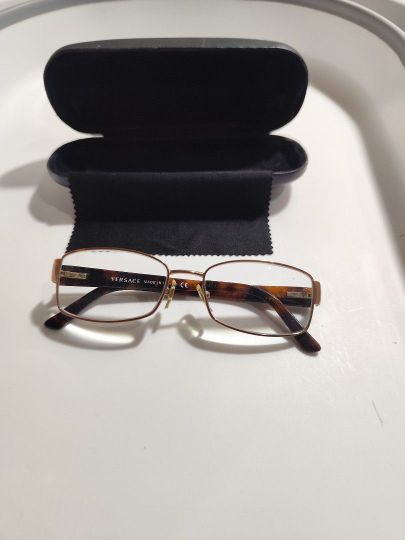 Versace Eyeglasses Frame (Category: Sunglasses & Eyewear) located in Cebu City. Submitted by icoolectnsellect (Listing ID 1467147598, Image 1). Description: Issue: Minor Scratch, Dirt and RX lens. Bought at Garage Sale. Authenticity not Guaranteed, di ko alam if legit or Fake. Buy @ your own Risk. All EyeGlasses or Sun Glasses ay may Grado or Prescription Glasses. Please be careful para di masira mata nyo, you can change the lens and frame na lng