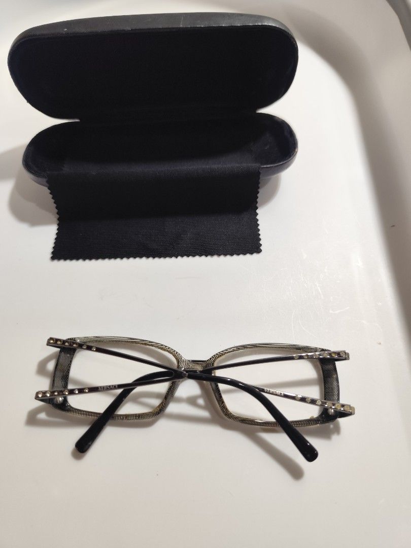 Versace Eyeglasses Frames (Category: Sunglasses & Eyewear) located in Cebu City. Submitted by icoolectnsellect (Listing ID 1467148087, Image 2). Description: Issue: Minor Scratch, Dirt and RX lens. Bought at Garage Sale. Authenticity not Guaranteed, di ko alam if legit or Fake. Buy @ your own Risk. All EyeGlasses or Sun Glasses ay may Grado or Prescription Glasses. Please be careful para di masira mata nyo, you can change the lens and frame na ln