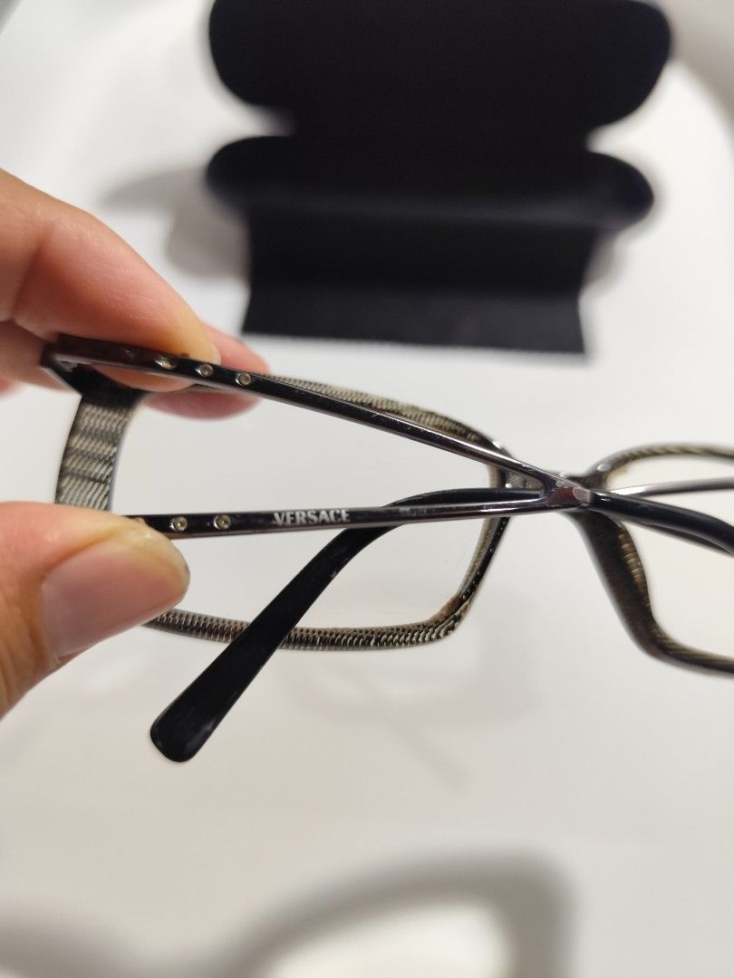 Versace Eyeglasses Frames (Category: Sunglasses & Eyewear) located in Cebu City. Submitted by icoolectnsellect (Listing ID 1467148087, Image 3). Description: Issue: Minor Scratch, Dirt and RX lens. Bought at Garage Sale. Authenticity not Guaranteed, di ko alam if legit or Fake. Buy @ your own Risk. All EyeGlasses or Sun Glasses ay may Grado or Prescription Glasses. Please be careful para di masira mata nyo, you can change the lens and frame na ln