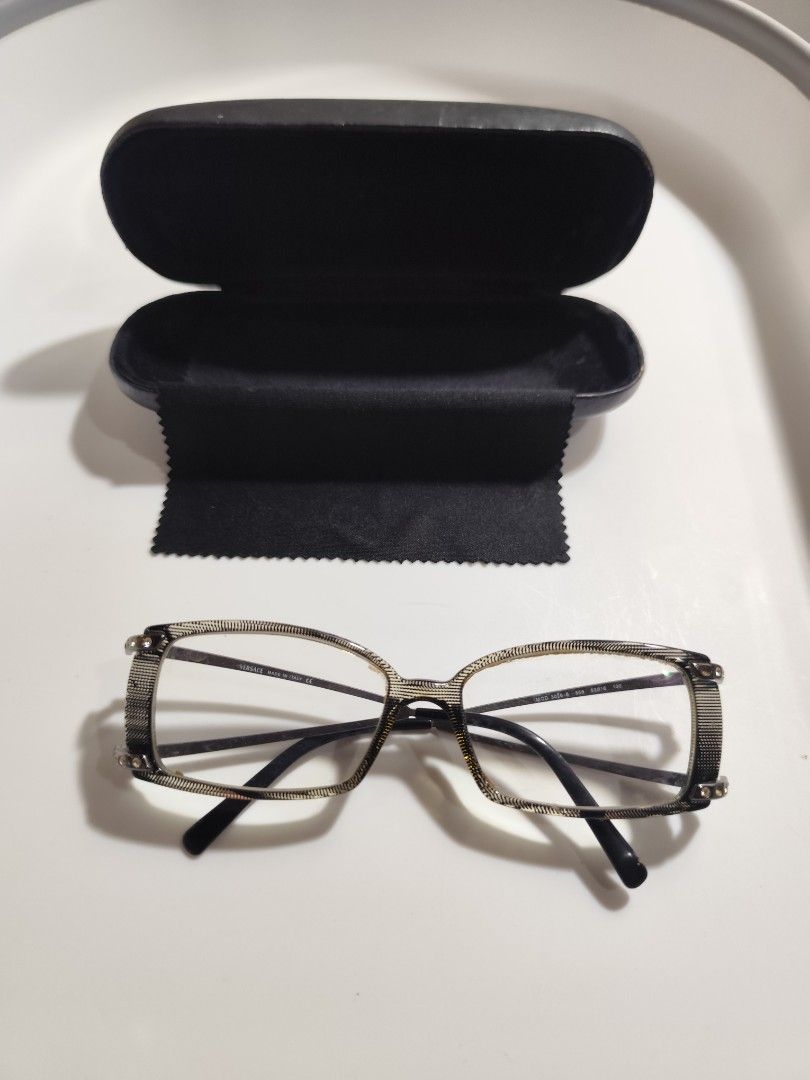 Versace Eyeglasses Frames (Category: Sunglasses & Eyewear) located in Cebu City. Submitted by icoolectnsellect (Listing ID 1467148087, Image 1). Description: Issue: Minor Scratch, Dirt and RX lens. Bought at Garage Sale. Authenticity not Guaranteed, di ko alam if legit or Fake. Buy @ your own Risk. All EyeGlasses or Sun Glasses ay may Grado or Prescription Glasses. Please be careful para di masira mata nyo, you can change the lens and frame na ln