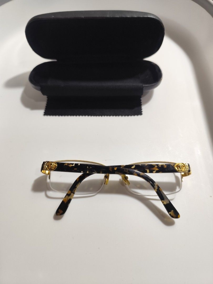 Versace Frame semi rimless (Category: Sunglasses & Eyewear) located in Cebu City. Submitted by icoolectnsellect (Listing ID 1467148789, Image 2). Description: Issue: Minor Scratch, Dirt and RX lens. Bought at Garage Sale. Authenticity not Guaranteed, di ko alam if legit or Fake. Buy @ your own Risk. All EyeGlasses or Sun Glasses ay may Grado or Prescription Glasses. Please be careful para di masira mata nyo, you can change the lens and frame na l