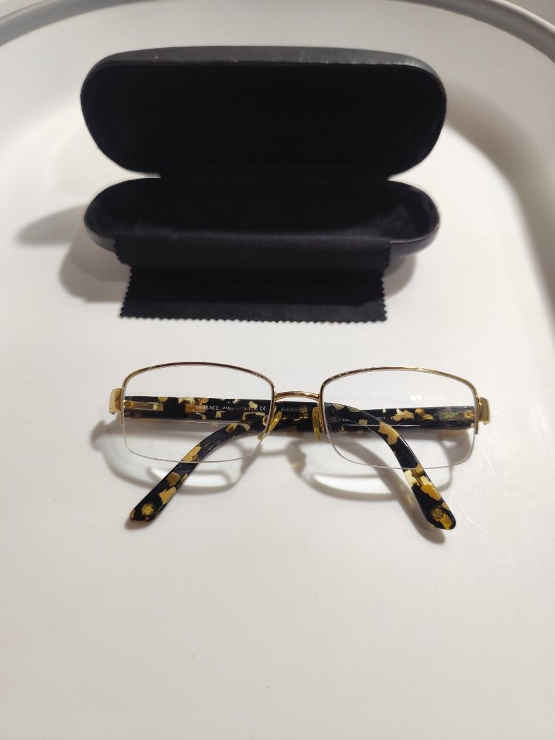 Versace Frame semi rimless (Category: Sunglasses & Eyewear) located in Cebu City. Submitted by icoolectnsellect (Listing ID 1467148789, Image 1). Description: Issue: Minor Scratch, Dirt and RX lens. Bought at Garage Sale. Authenticity not Guaranteed, di ko alam if legit or Fake. Buy @ your own Risk. All EyeGlasses or Sun Glasses ay may Grado or Prescription Glasses. Please be careful para di masira mata nyo, you can change the lens and frame na l