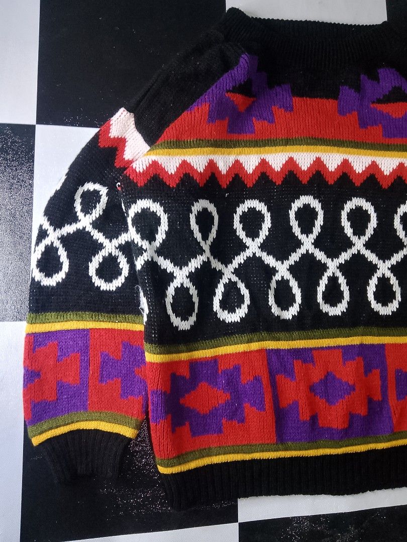 Vintage 1980s / 1990s Vis-a-vis Multicolor patterned Knitted Sweater (Category: Coats, Jackets and Outerwear) located in Binan City. Submitted by incnt (Listing ID 1467150205, Image 3). Description: 350 Pesos only add shipping fee Size Medium 22*25 Very good condition No issues *Missing Main tag Made In USA This item is an authentic vintage 1980s / 1990s Vis-A-Vis knit pullover sweater. It features a distinctive black base adorned with vibrant, m