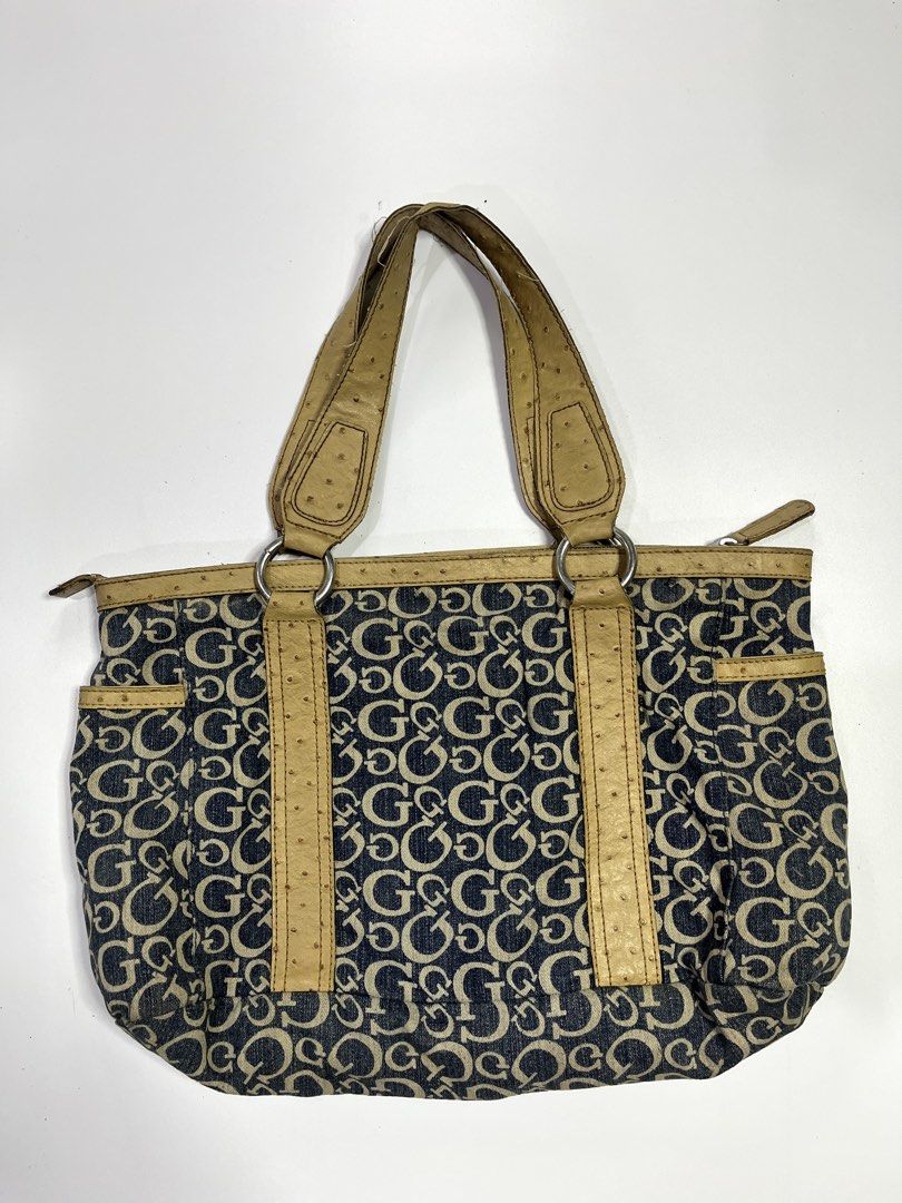 Vintage Guess Denim Bag (Category: Shoulder Bags) located in Manila. Submitted by kerlythreads (Listing ID 1438382796, Image 2). Description: - faux ostrich leather - signs of usage on handle & minimal stain - can fit laptop - still in a very good condition .