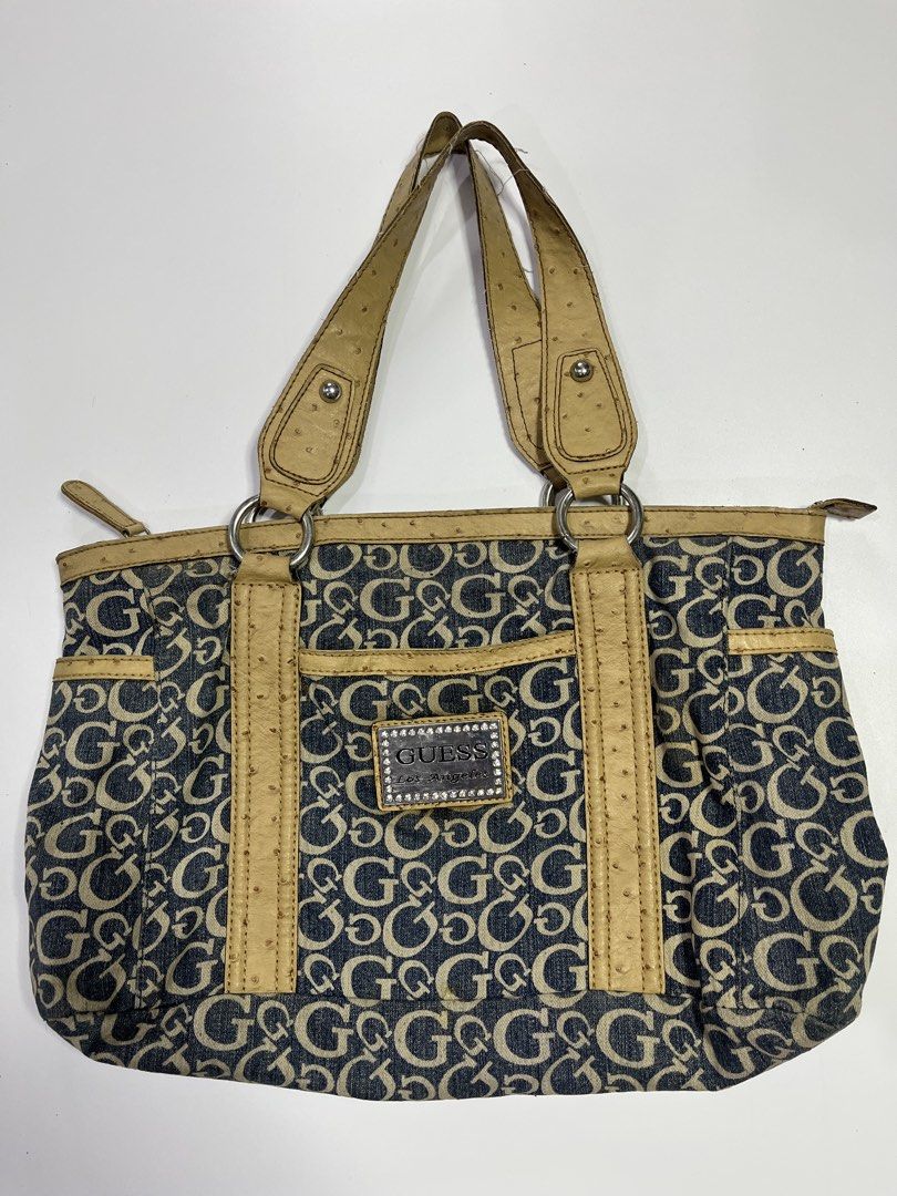 Vintage Guess Denim Bag (Category: Shoulder Bags) located in Manila. Submitted by kerlythreads (Listing ID 1438382796, Image 1). Description: - faux ostrich leather - signs of usage on handle & minimal stain - can fit laptop - still in a very good condition .