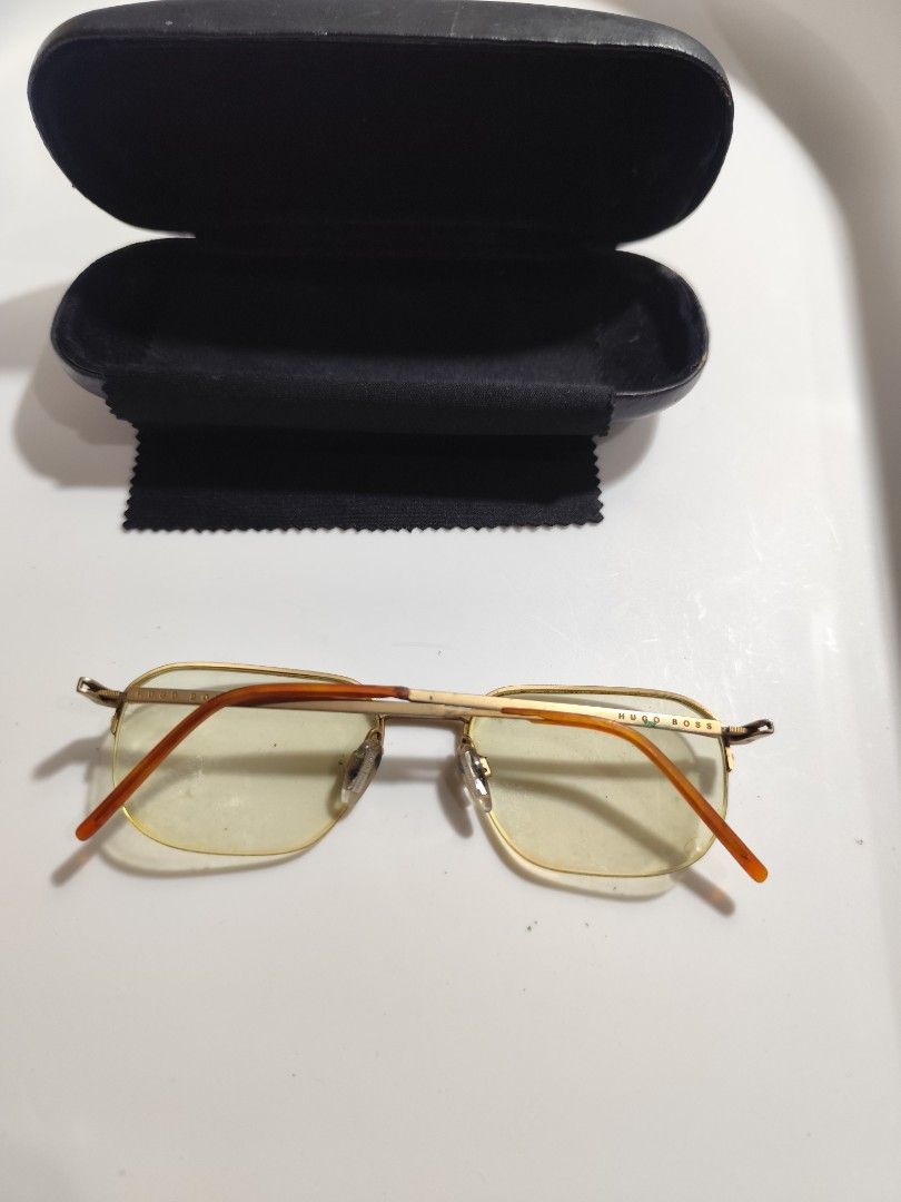 Vintage Hugo Boss Gold Framed (Category: Sunglasses & Eyewear) located in Cebu City. Submitted by icoolectnsellect (Listing ID 1467145500, Image 2). Description: Issue: Minor Scratch, Dirt and RX lens. at broken plastic sa temple Bought at Garage Sale. Authenticity not Guaranteed, di ko alam if legit or Fake. Buy @ your own Risk. All EyeGlasses or Sun Glasses ay may Grado or Prescription Glasses. Please be careful para di masira mata nyo, you can