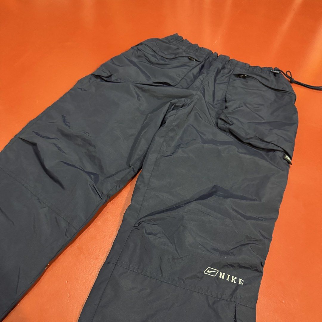 VINTAGE NIKE PARACHUTE UTILITY PANTS (Category: Headphones & Headsets) located in Pasig City. Submitted by buzzthrifty (Listing ID 1467002341, Image 2). Description: SIZE 30-34WAIST 38"LENGTH 10"HEM EXCELLENT CONDITION .