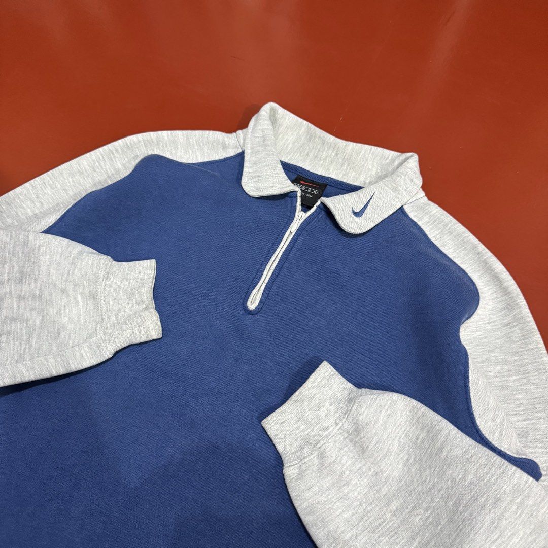 VINTAGE NIKE QZIP SWEATER (Category: Earphones) located in Pasig City. Submitted by buzzthrifty (Listing ID 1467000321, Image 1). Description: SIZE S-M MEN M-L WOMEN 19x24 EXCELLENT CONDITION.