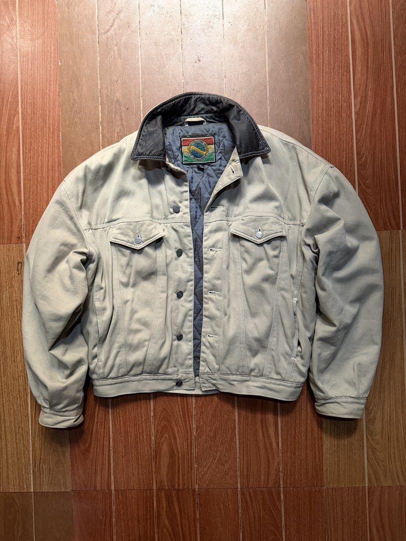 Vintage Structure Beige Denim Jacket with Contrast Collar (Category: Coats, Jackets and Outerwear) located in Dasmarinas. Submitted by kylebecker (Listing ID 1467001325, Image 1). Description: - Brand: Structure - Color: Beige denim with dark contrasting faux leather collar - Lining: Quilted blue inner lining for added warmth - Fit: Classic boxy fit, ideal for layering - Features: Button-up front closure and dual chest flap pockets - Condition: E