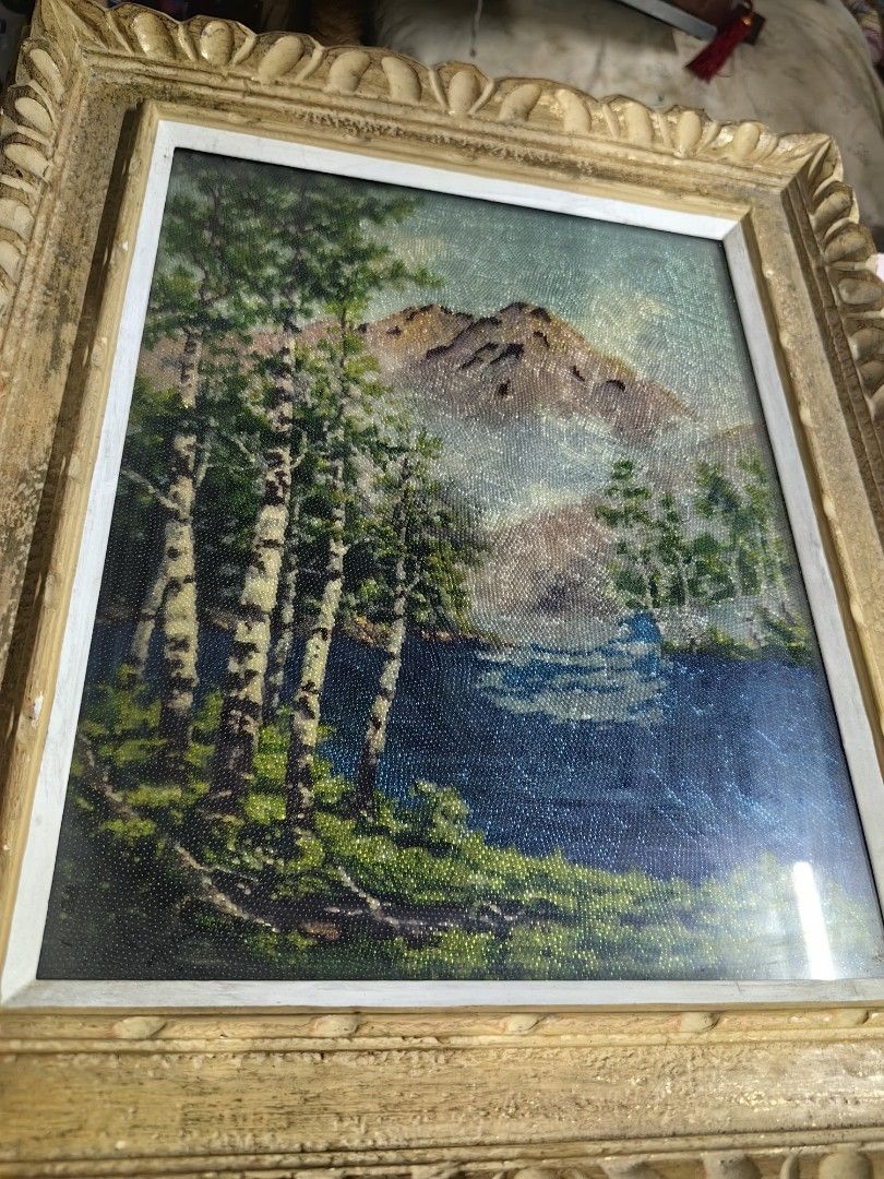 Mountain and Forest Landscape Framed Wall Art (Category: Frames & Pictures) located in Rizal. Submitted by gkstcenit (Listing ID 1467163444, Image 2). Description: - Stunning textured beaded artwork of a peaceful mountain, lake, and forest - Detailed birch trees in the foreground with beautiful handmade texture throughout - Size: Approximately 17 x 22 inches (see tape measure in photos) - Frame: Heavy decorative wooden frame with an elegant antiq