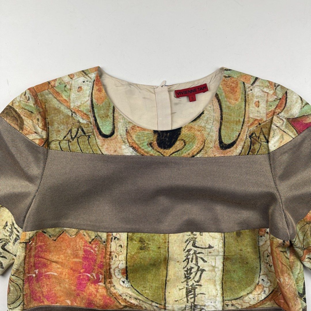 Vivienne Tam Kwan Yin Blouse (Category: Blouses) located in Manila. Submitted by jademax (Listing ID 1467141217, Image 3). Description: Size Small Length: 22” Pit: 18” Shoulder: 13.5” Sleeve: 10.5”.