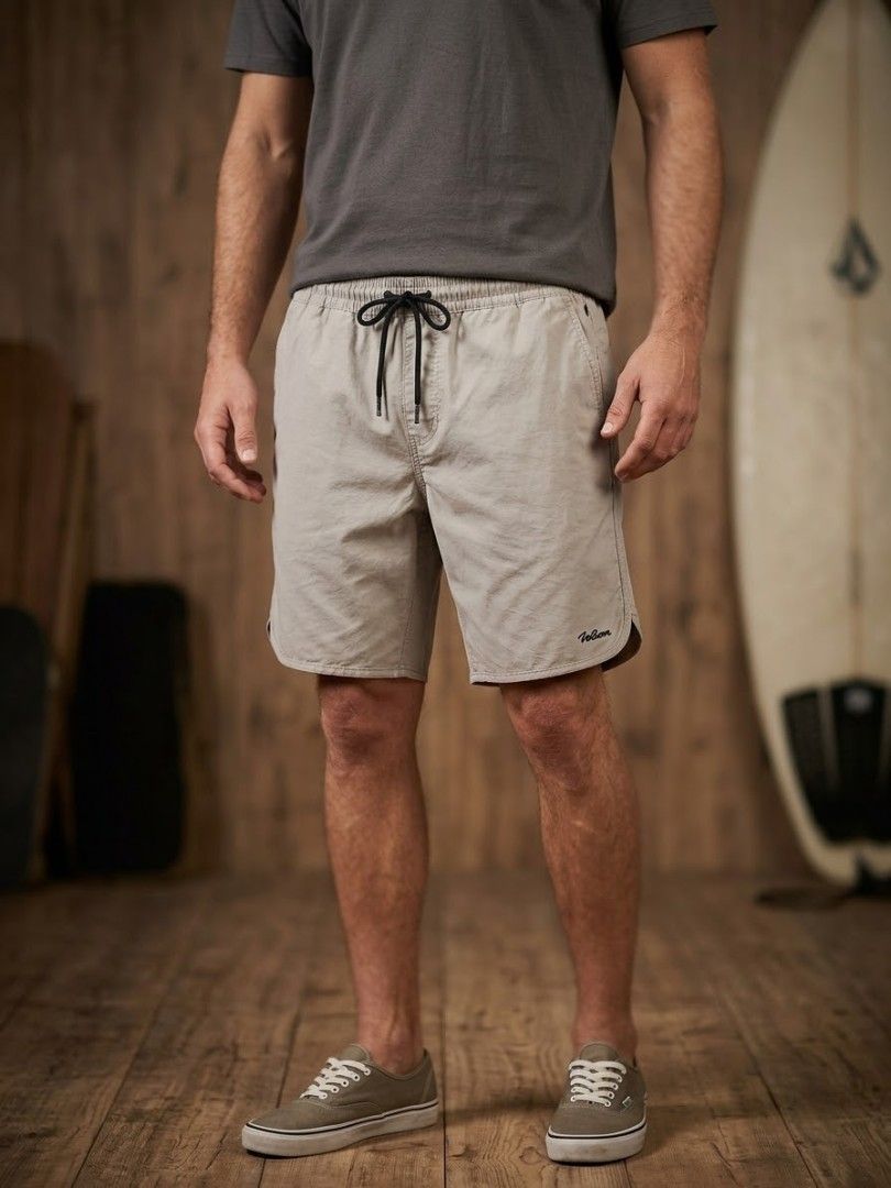 Volcom grey elastic drawstring surf shorts (Category: Shorts) located in Cebu City. Submitted by ranilcanoy89684 (Listing ID 1467166244, Image 1). Description: - Brand: Volcom - Color: Grey - Style: Lightweight surf shorts - Waistband: Elastic with black contrast drawstring - Pockets: Side pockets and one back pocket with branded patch - Branding: Volcom script logo on lower left leg and stone logo near hem - Ideal for: Beach days and casual wear