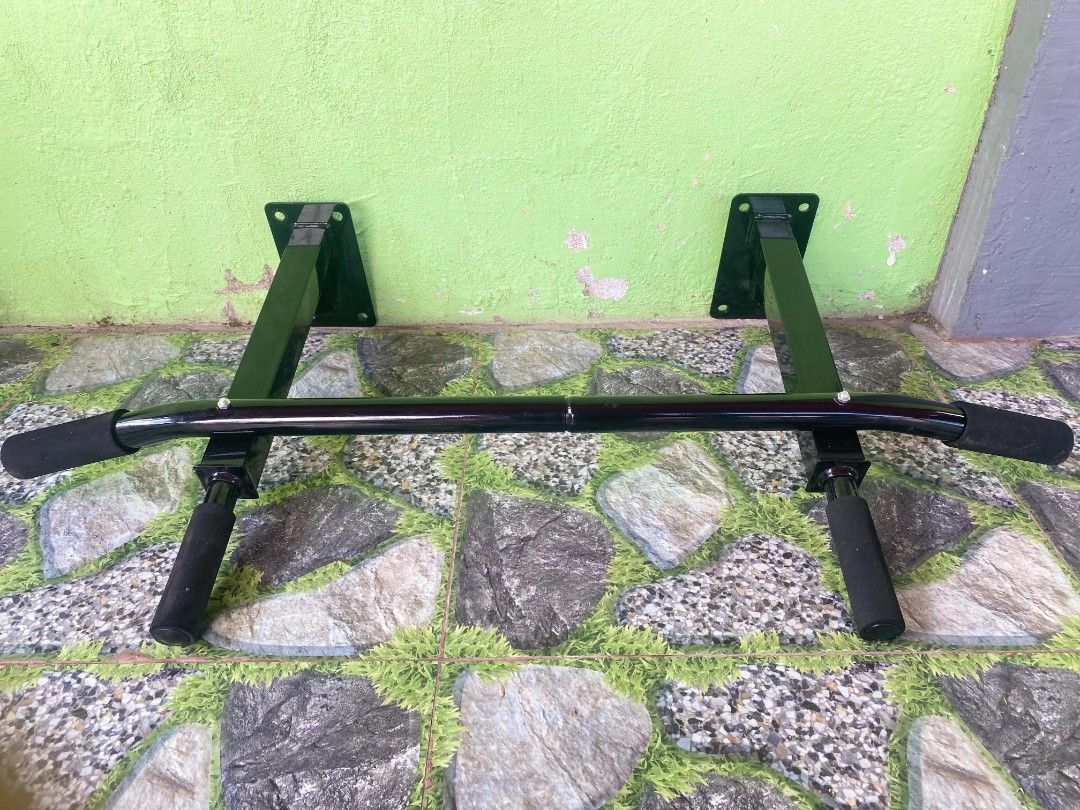Wall Mount Pull Up Bar Chin Up Bar Gym Equipment (COD) (Category: Weights & Dumbbells) located in Caloocan City. Submitted by keencloud_9f37ba (Listing ID 1467016913, Image 2). Description: - Heavy-duty steel construction built for intense home workouts - Multiple grip positions with comfortable foam handles for variety - Sleek black powder-coated finish prevents rust and wear - Sturdy mounting brackets with pre-drilled holes for secure wall inst