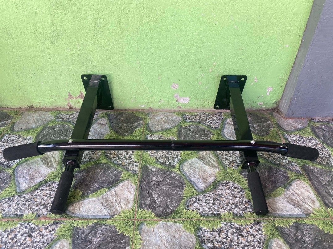 Wall Mount Pull Up Bar Chin Up Bar Gym Equipment (COD) (Category: Weights & Dumbbells) located in Caloocan City. Submitted by keencloud_9f37ba (Listing ID 1467016913, Image 1). Description: - Heavy-duty steel construction built for intense home workouts - Multiple grip positions with comfortable foam handles for variety - Sleek black powder-coated finish prevents rust and wear - Sturdy mounting brackets with pre-drilled holes for secure wall inst