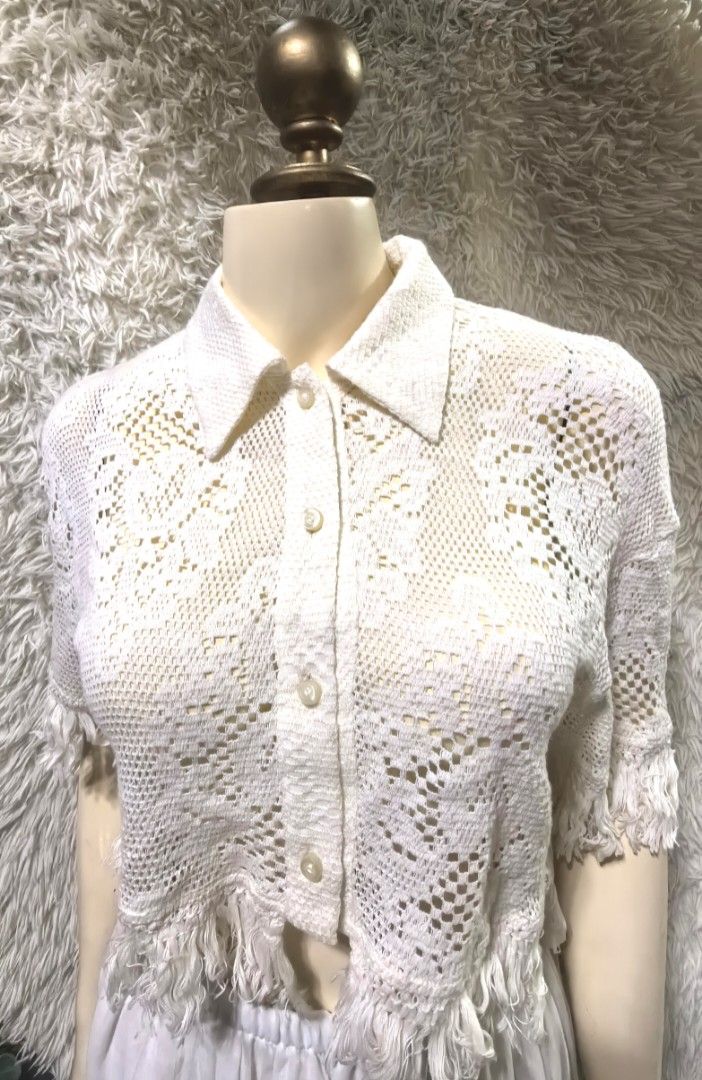 White Crochet Fringe Button-Down Top (Category: Longsleeves) located in Mexico. Submitted by hele_blushandthrift (Listing ID 1467038541, Image 1). Description: Style: Cropped open-knit cardigan / top Color: White / off-white Material: Soft cotton crochet knit - breathable and lightweight.