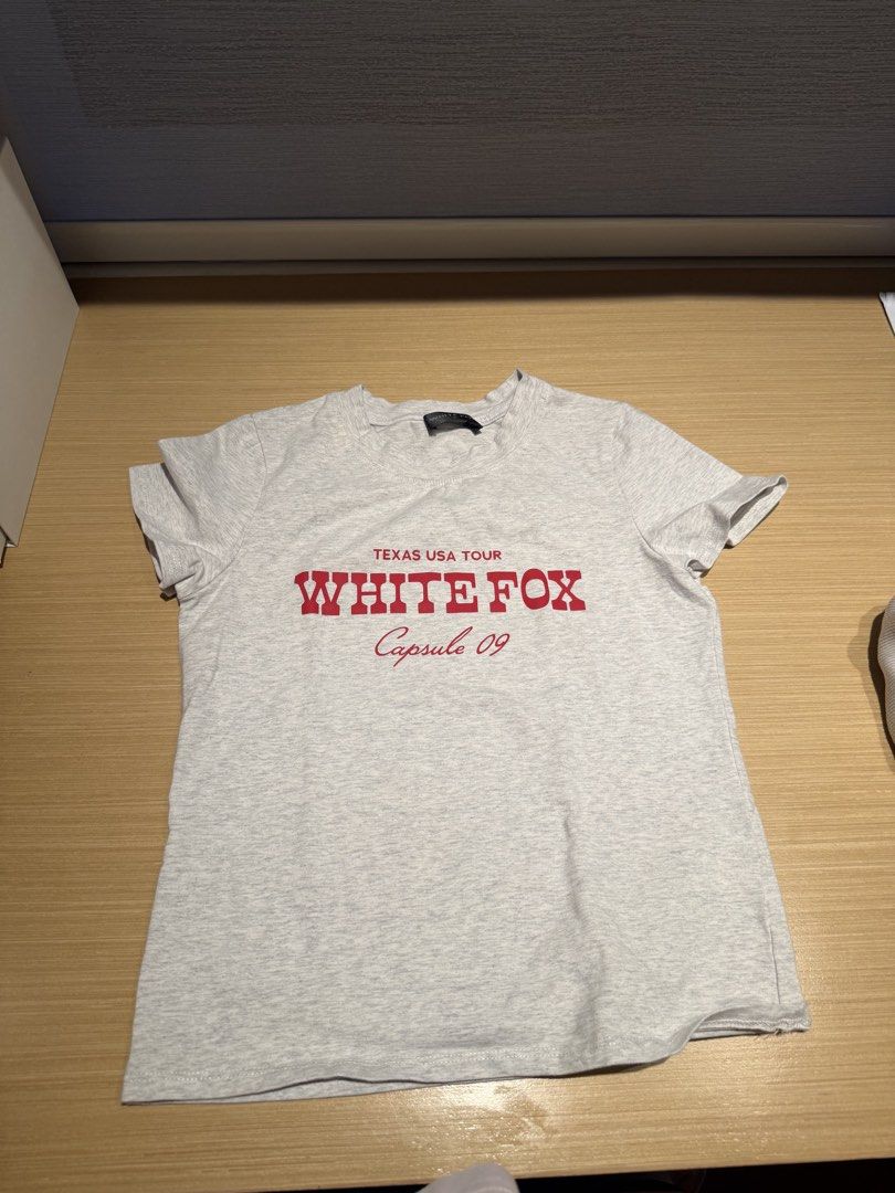 White fox grey graphic baby tee (Category: Shirts) located in Makati City. Submitted by jorjarosee (Listing ID 1467097876, Image 1). Description: .