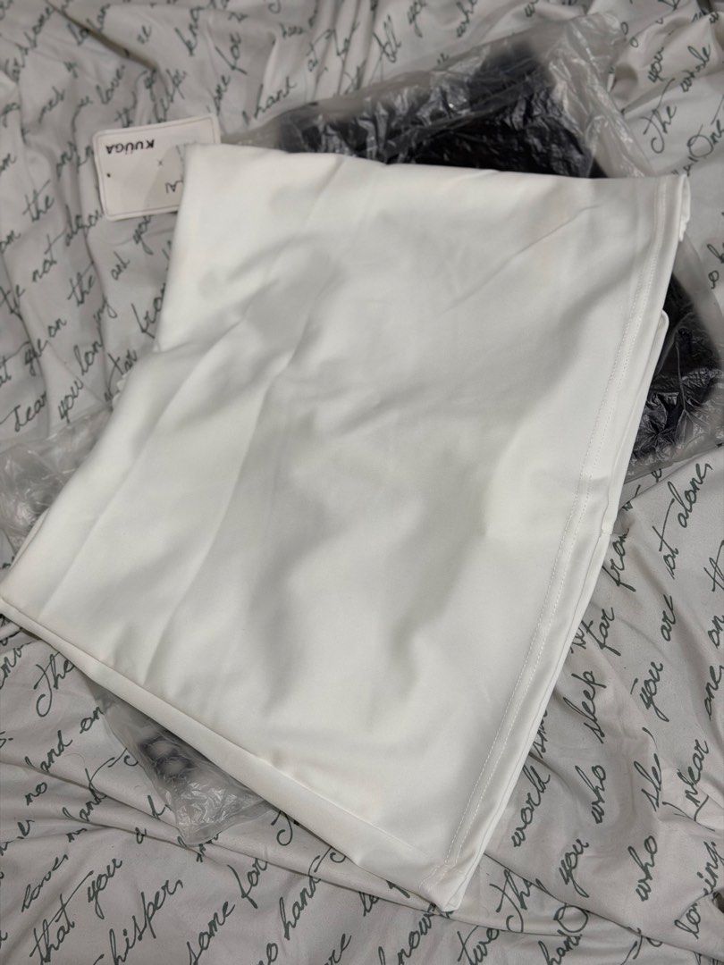 White Mini Skirt (Category: Skirts) located in Manila. Submitted by sbm_declutters (Listing ID 1456664317, Image 2). Description: - Simple white mini skirt - Built in shorts underneath - Flattering A-line cut - Convenient side zipper closure - Stylish faux leather material - Versatile: dress up or down - Easy to pair with any top.