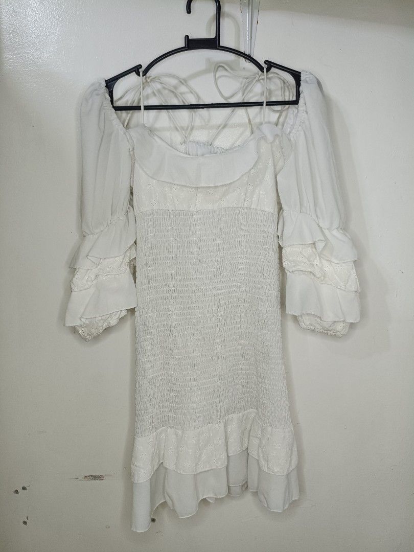 White Off-Shoulder Smocked Ruffle Dress (Category: Dresses) located in Santa Maria. Submitted by abclosetph (Listing ID 1466980531, Image 1). Description: medida size! bust: 37-39 inches waist: 32-38 inches length: 30 inches - color may vary due to lighting - manage your expectations, these are preloved items..