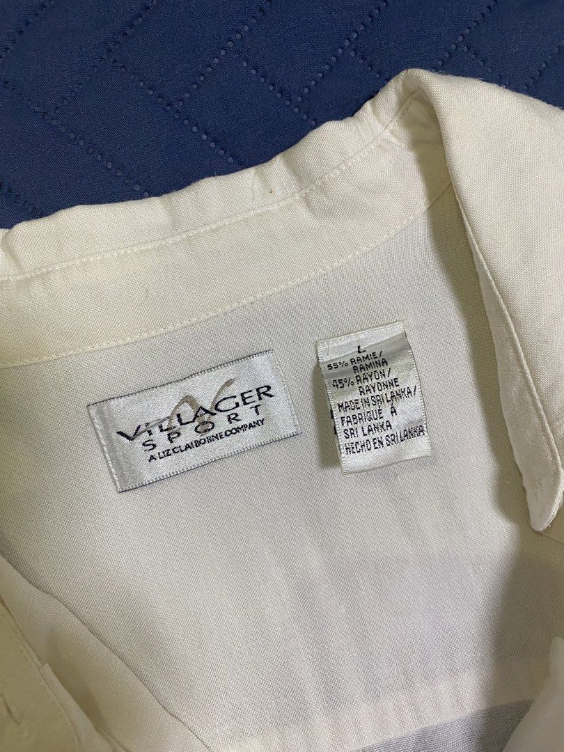 White ramie rayon button up shirt large (Category: Formal Shirts) located in Manila. Submitted by escherichiaa (Listing ID 1467136841, Image 2). Description: - Brand: Villager Sport (Liz Claiborne company) - Color: Classic White - Size: Large - Material: 55% Ramie, 45% Rayon (lightweight and breathable) - Features: Long sleeves, classic collar, single chest pocket, and curved hemline - Origin: Made in Sri Lanka - Condition: Great for layering or 