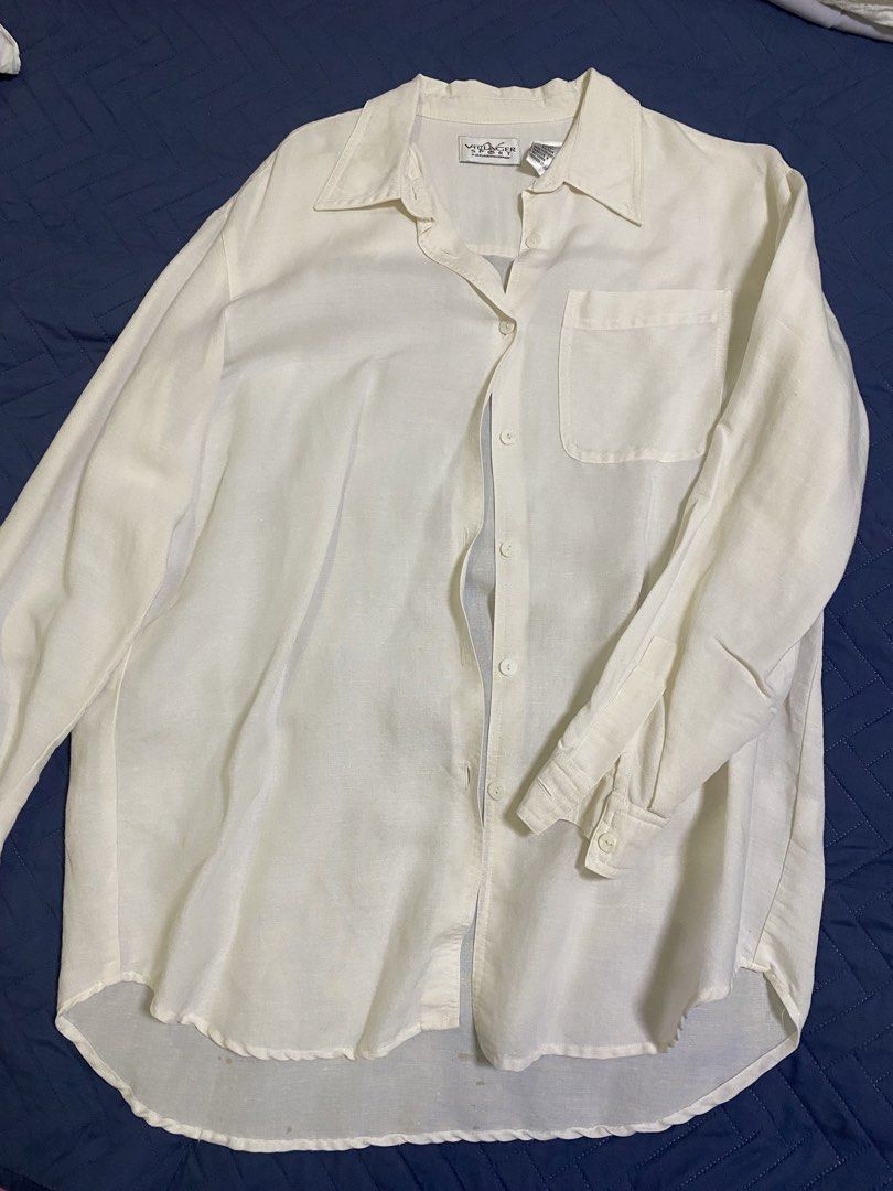 White ramie rayon button up shirt large (Category: Formal Shirts) located in Manila. Submitted by escherichiaa (Listing ID 1467136841, Image 1). Description: - Brand: Villager Sport (Liz Claiborne company) - Color: Classic White - Size: Large - Material: 55% Ramie, 45% Rayon (lightweight and breathable) - Features: Long sleeves, classic collar, single chest pocket, and curved hemline - Origin: Made in Sri Lanka - Condition: Great for layering or 