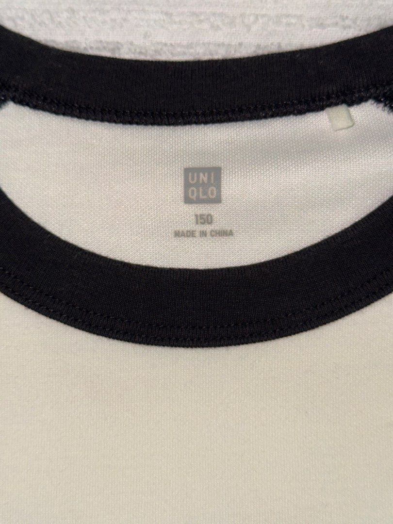 White Uniqlo Shirt (Category: Shirts) located in Daet. Submitted by sbcookieee (Listing ID 1467035493, Image 3). Description: Length: 55 cm Width: 46 cm.