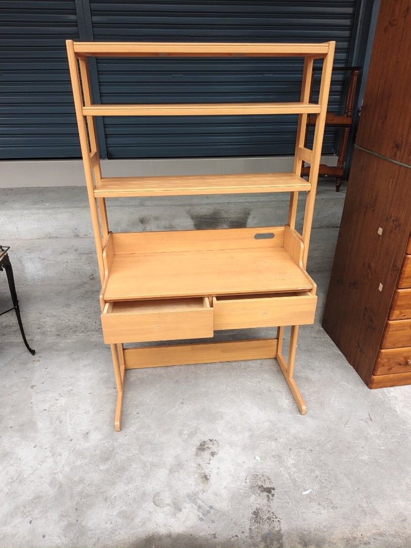 Wooden Study Desk with Bookshelf (Category: Tables & Sets) located in Valenzuela. Submitted by kendra071914 (Listing ID 1466993699, Image 3). Description: - Type: Wooden study desk with built-in bookshelf tower - Finish: Clean light wood finish - Storage: 2 pull-out drawers & 3 open shelves for books and essentials - Build: Sturdy and durable frame construction - Dimensions: 90cm (L) x 44cm (W) x 155cm (H) - Condition: Brand new / Excellent - Per