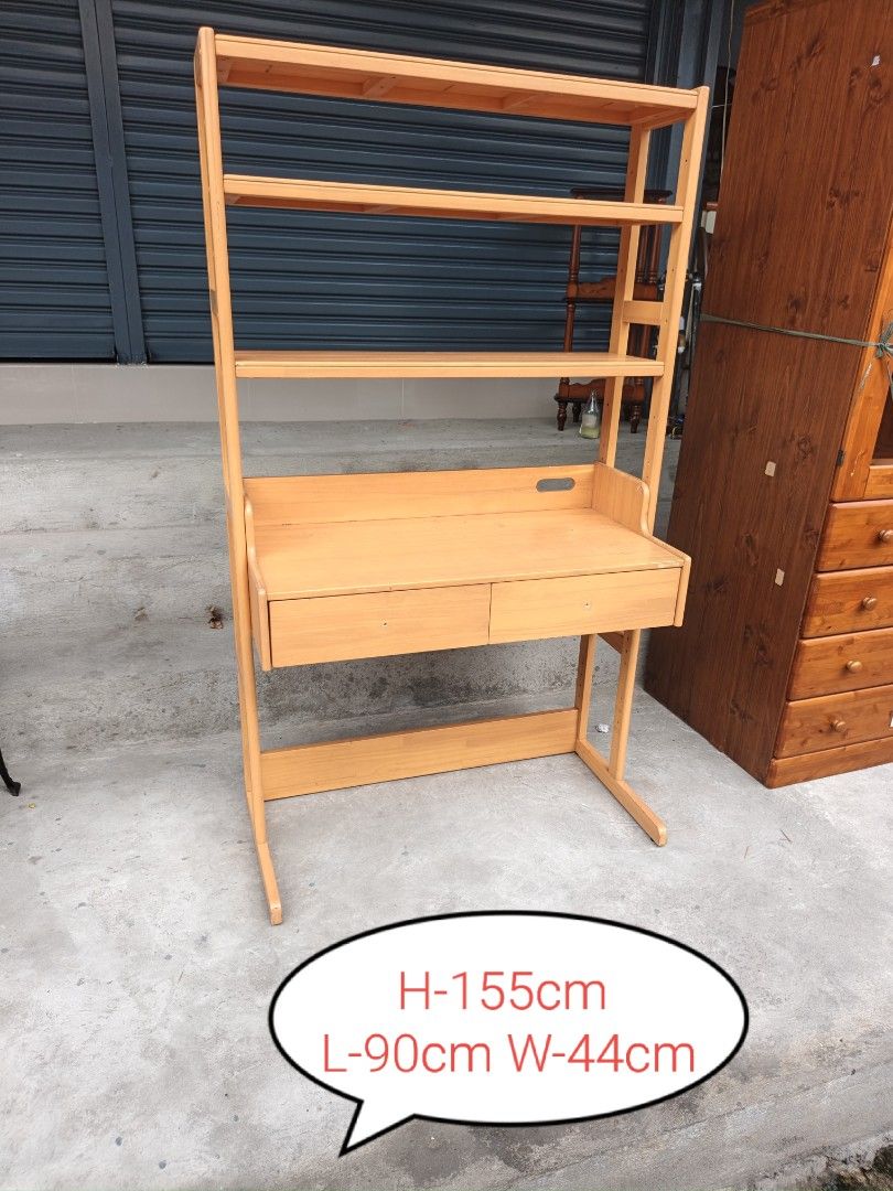 Wooden Study Desk with Bookshelf (Category: Tables & Sets) located in Valenzuela. Submitted by kendra071914 (Listing ID 1466993699, Image 1). Description: - Type: Wooden study desk with built-in bookshelf tower - Finish: Clean light wood finish - Storage: 2 pull-out drawers & 3 open shelves for books and essentials - Build: Sturdy and durable frame construction - Dimensions: 90cm (L) x 44cm (W) x 155cm (H) - Condition: Brand new / Excellent - Per