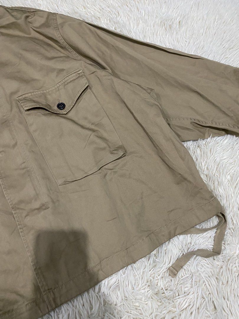 Workware Heritage Clothing Co. Khaki Jacket Size Medium (Category: Coats, Jackets and Outerwear) located in Antipolo. Submitted by switchneighborhood (Listing ID 1467118056, Image 2). Description: - Brand: Workware Heritage Clothing Co. - Condition: Brand new with tag still attached - Size: Medium fits XL - Color: Khaki - Style: Utility jacket - Features: Two large front chest pockets, button closures, adjustable drawstring hem, and button detail