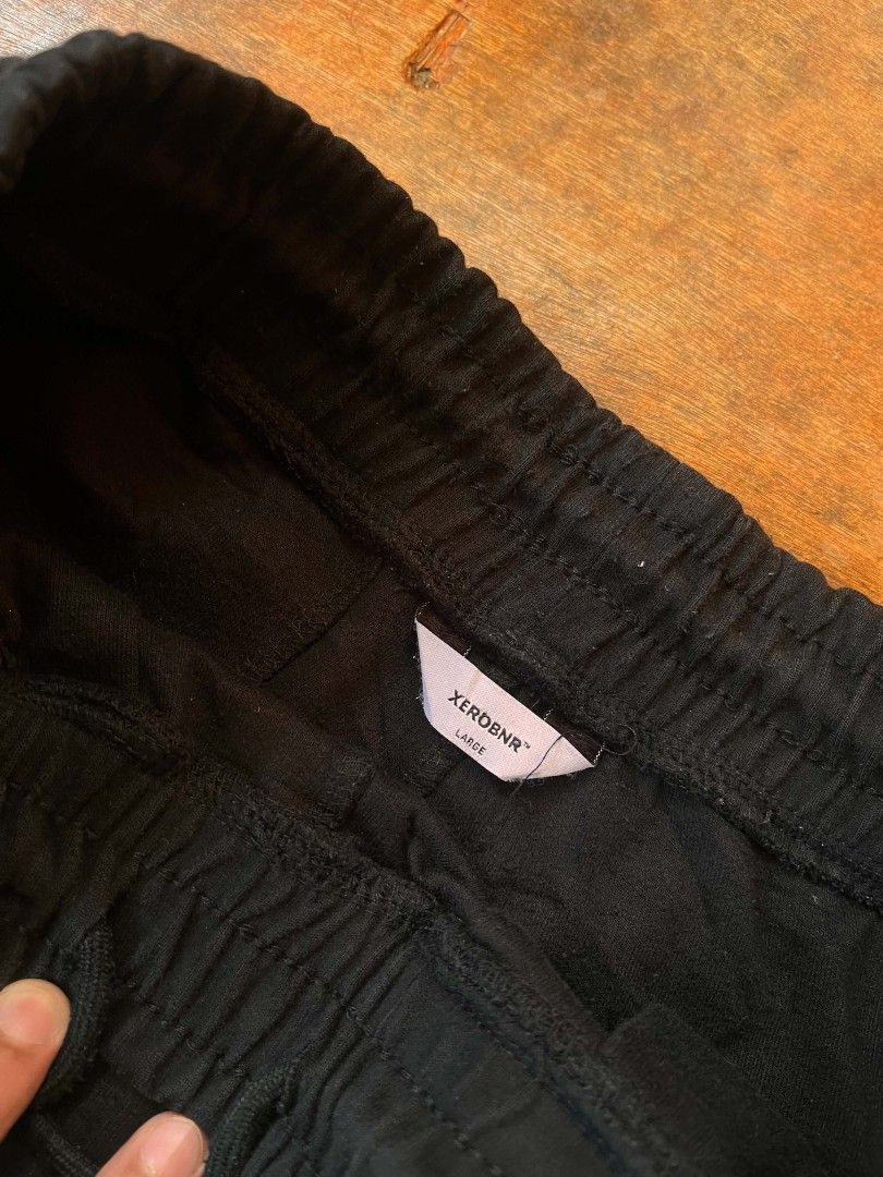 Xerobnr Black Shorts Size Large (Category: Shorts) located in Davao. Submitted by francismark_29 (Listing ID 1467007051, Image 2). Description: - Brand/Model: Xerobnr - Size: Large - Color: Black - Waistband: Elastic with adjustable drawstring closure - Pockets: Deep side pockets - Fit: Relaxed fit through the legs - Material: Comfortable cotton or cotton-blend fabric - Condition: Clean tag inside.