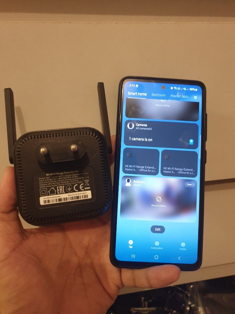 Xiaomi Mi Wi-Fi Range Extender Pro R03 (Category: Networking) located in Manila. Submitted by lesterjohn17980 (Listing ID 1467002388, Image 2). Description: - Brand: Xiaomi Mi Wi-Fi Range Extender Pro (Model R03) - Design: Sleek black housing with dual external antennas - Convenience: Plugs directly into any wall socket - Performance: Effectively eliminates dead zones and expands wireless coverage - Setup: Quick and easy installation via mobile a