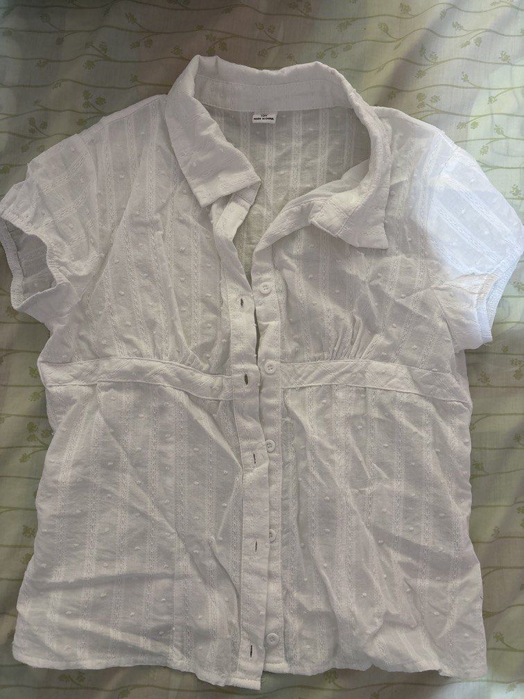 Y2K White Polo Top (Category: Shirts) located in Manila. Submitted by luxurenaomi (Listing ID 1467009657, Image 1). Description: too small on me :[ preferably 24-25 waist line can do offers!.