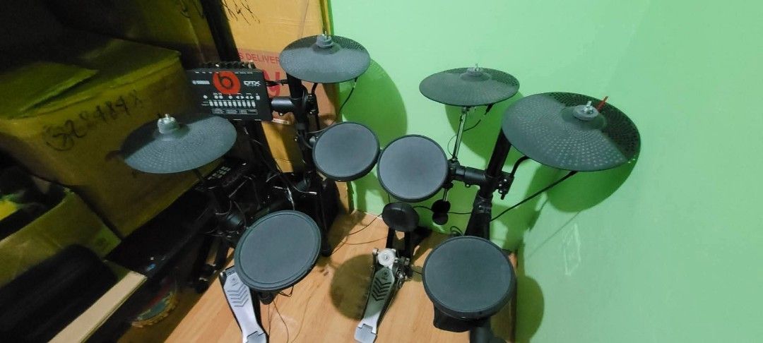 Yamaha DTX Electronic Drum Set (Category: Musical Instruments) located in Manila. Submitted by goldenwhale_9c1a37 (Listing ID 1467141630, Image 1). Description: - Yamaha DTX electronic drum kit, fully functional - Includes drum module, rubber pads, cymbals, and foot pedals - Compact rack design ideal for tight spaces and small rooms - Great for quiet home practice using headphones - Standard setup ready for both practice and recording.