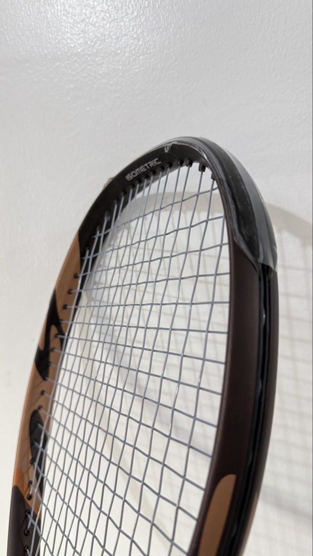 Yonex Ezone Espresso (Category: Racket and Ball Sports) located in Digos. Submitted by vavavroom6 (Listing ID 1467016517, Image 3). Description: - Brand: Yonex Ezone Alpha - Head Size: 100 square inches - Weight: 275g - Balance: 330mm - Length: 27 inches - String Pattern: 16x18 - Grip Size: G2 (4 1/4) - Colorway: Brown and bronze with orange overgrip installed - Condition: Strung and ready for play - String: Head Lynx Touch (Coco Gauff) - Tension