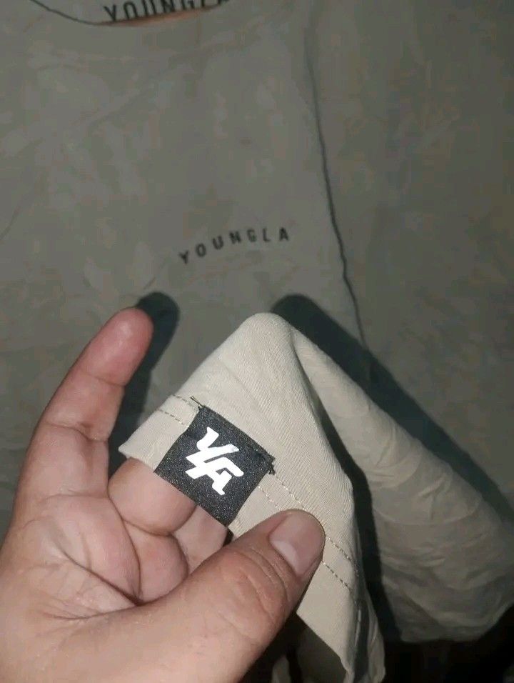YOUNGLA (Category: Tshirts & Polo Shirts ) located in Taguig. Submitted by clothingselection (Listing ID 1467047871, Image 3). Description: PTPA YOUNGLA WIDTH 24.5 LENGTH 29.5 EXCELLENT CONDITION NID WASH FRESH FROM BALE.