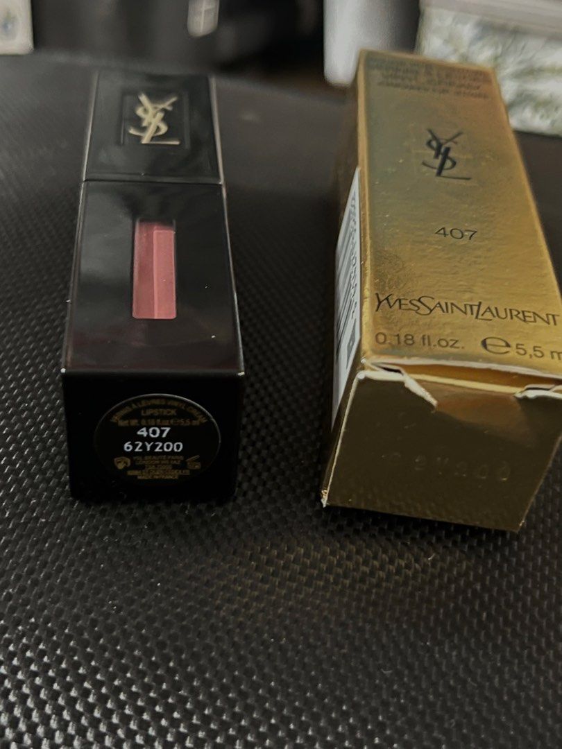 YSL creamy lipstick #407 (Category: Makeup) located in Manila. Submitted by santanajdd (Listing ID 1466813263, Image 3). Description: YSL Vinyl Creamy Lip Stain 💗 * shade: 407 Carmin Session * high coverage lip stain with glossy finish * beautiful muted rose, plum color * comes with original packaging * authentic, never used - doesn't fit my personal makeup looks 💬 dm for more info!.