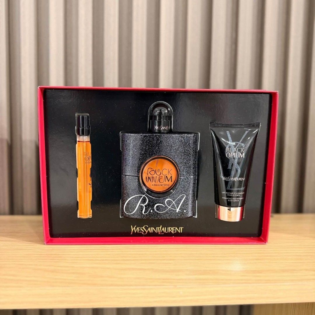 Yves Saint Laurent Black Opium Gift Set (Category: Fragrance & Deodorants) located in Manila. Submitted by rhona30antiquera (Listing ID 1467025431, Image 1). Description: - Brand: Yves Saint Laurent (YSL) - Item: Black Opium Fragrance Gift Set - Includes: Large glittery perfume bottle, travel-sized spray vial, and hydrating body lotion tube - Packaging: Elegant red gift box with black inlay - Condition: Brand new / Great for gifting - Meet-ups an