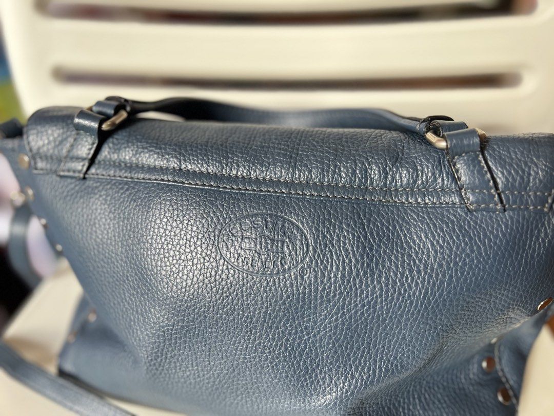 Zanellato Postina Small in Blue Pebbled Leather (Category: Luxury Bags & Wallets) located in Quezon City. Submitted by kaye_mm (Listing ID 1467101952, Image 3). Description: • Authenticity: 100% Authentic/ Original • Material: 100% grained/hammered calfskin leather exterior; 100% cotton lining interior • Color: Blue • Dimensions (Small): Approximately 29 cm x 20 cm x 15 cm • Features: Flap top with a twist-lock fastening, metal stud accents, sing