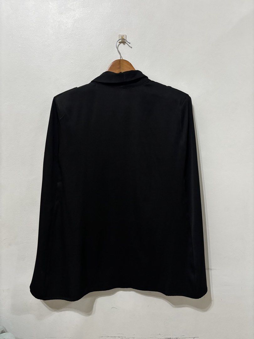 Zanzea Collection Black Open Front Blazer Size L (Category: Coats, Jackets and Outerwear) located in Makati City. Submitted by maqui0730 (Listing ID 1467033553, Image 2). Description: - Used once - Brand: Zanzea Collection - Size: L (tag attached inside collar) - Color: Plain Black - Style: Open front with drape lapel and structured shoulders - Sleeves: Long sleeves - Material: Smooth fabric - Condition/Use: Great for casual office wear or everyd