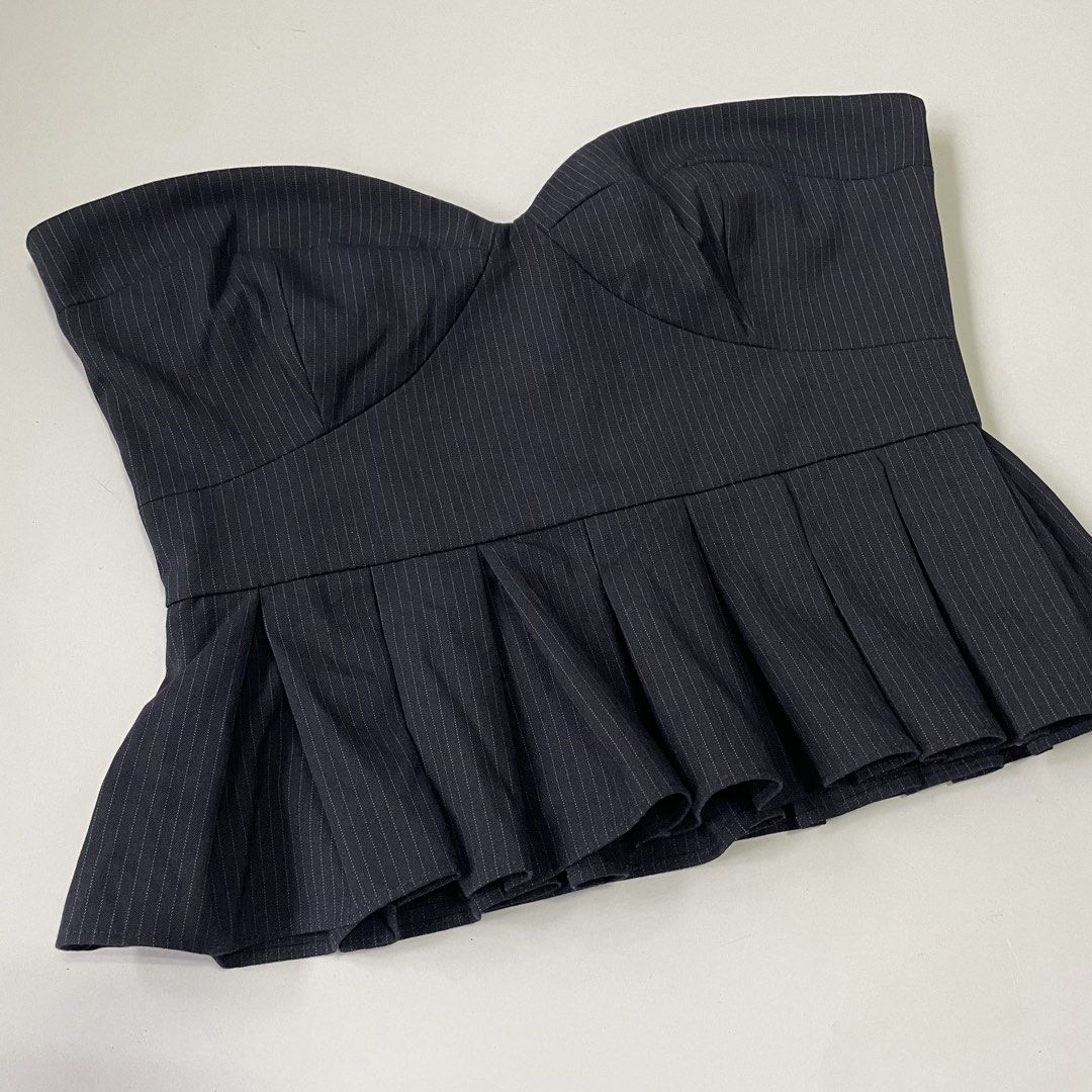 Zara Basic Pinstripe Strapless Peplum Corset Top (Category: Sleeveless) located in Pasay City. Submitted by lovedbyzea (Listing ID 1467040644, Image 3). Description: - with boning on the sides only - Brand: Zara Basic - Style: Strapless sweetheart neckline with built-in bustier cups - Design: Dark navy blue with fine white pinstripes and a flared, pleated peplum hem - Fit: Fitted bodice with a back zip and hook-and-eye fastening - Size: S - Condi