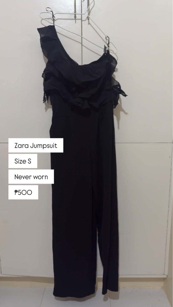 Zara Black One-Shoulder Ruffle Jumpsuit Size S (Category: Jumpsuits) located in Marikina City. Submitted by vparcon (Listing ID 1467065651, Image 1). Description: - Brand: Zara - Condition: Brand new with tags (never worn) - Size: Small - Color: Black - Style: One-shoulder with layered ruffles and straight leg cut - Occasion: Perfect for night outs and special events MARIKINA CITY.