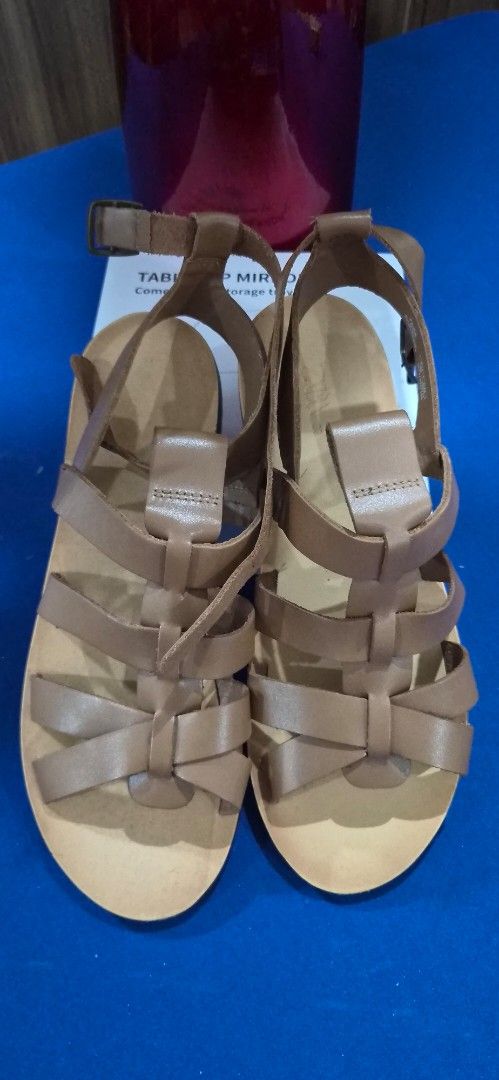 Zara Brown Strappy Flat Sandals (Category: Flats & Sandals) located in Manila. Submitted by pixiedachi (Listing ID 1467036680, Image 1). Description: - Brand: Zara - Style: Brown strappy gladiator sandals with minimalist design - Closure: Adjustable ankle buckle - Sole: Comfortable flat sole - Versatility: Perfect for warm weather, easily matches shorts, skirts, and dresses GENUINE LEATHER .