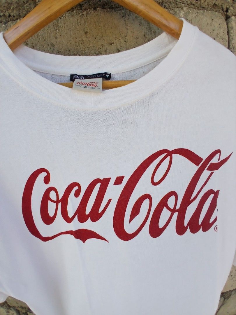 ZARA COCA-COLA TSHIRT 23x27 (Category: Formal Shirts) located in Munoz. Submitted by cabalardomine98 (Listing ID 1466973931, Image 2). Description: EXCELLENT NO ISSUE.