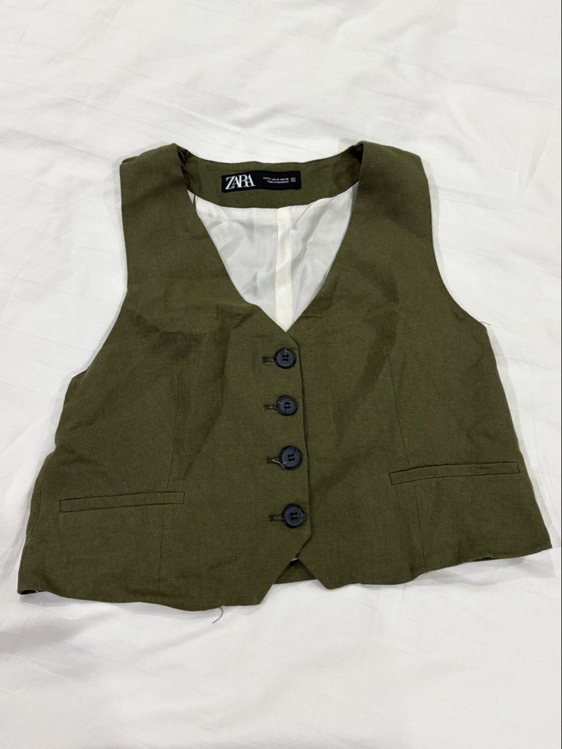 Zara Olive Green Button-Front Tailored Vest Top (Category: Others Tops) located in Muntinlupa City. Submitted by alexisofia (Listing ID 1467040358, Image 1). Description: never worn / excellent condition bought this top in paris size: small - medium Brand Zara.