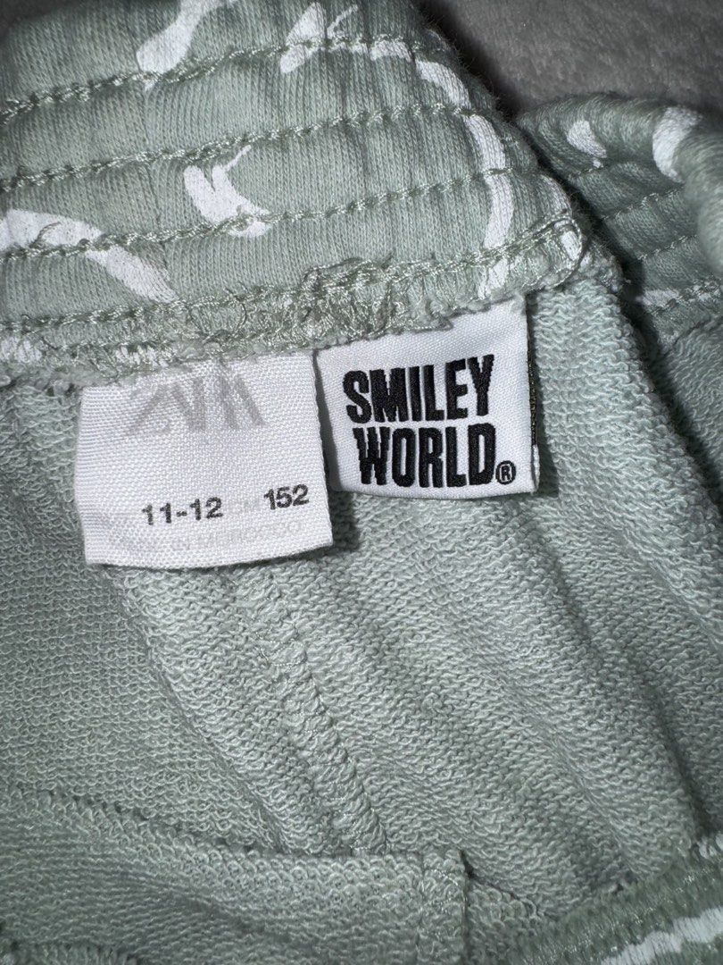 Zara Smiley Jogging Pants (Category: Babies & Kids Fashion) located in Quezon City. Submitted by coolmomma (Listing ID 1467112295, Image 3). Description: Slight stain but barely noticable Size on tag.