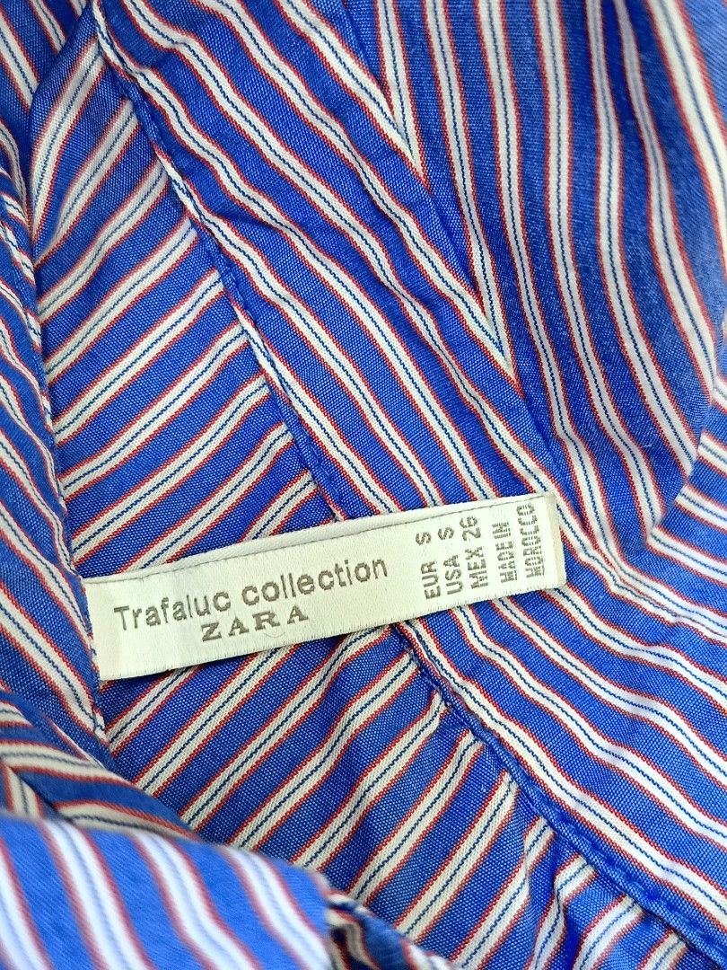 Made in Morocco Zara Trafaluc Collection Striped Button-Up Blouse Size S (Category: Blouses) located in Manila. Submitted by elyseva.356 (Listing ID 1467048091, Image 3). Description: ORIGINAL Zara Trafaluc Striped Print Multi-way/3-way Blouse Condition: Like New Size: Small OP: 2k+ SP: 650 (price is negotiable) RFS: Stocked/ Rarely used. Pm me if you're interested! Feel free to message me for more details..
